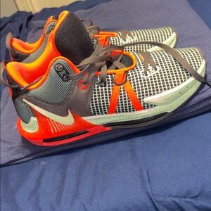 Nike Men's Black, Orange, and White Athletic Shoes